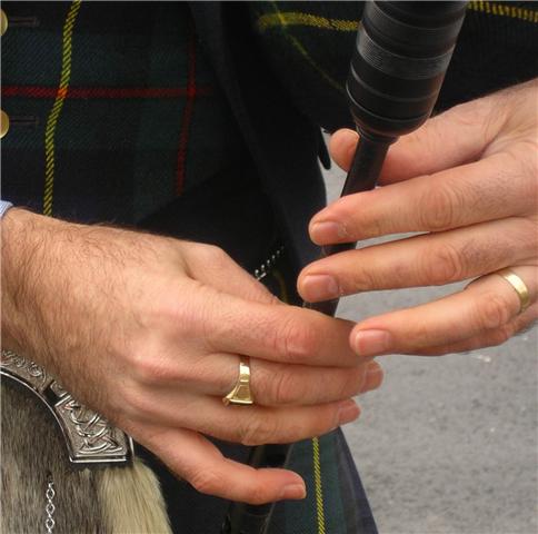 individual bagpiper or complete bagpipe band available for hire